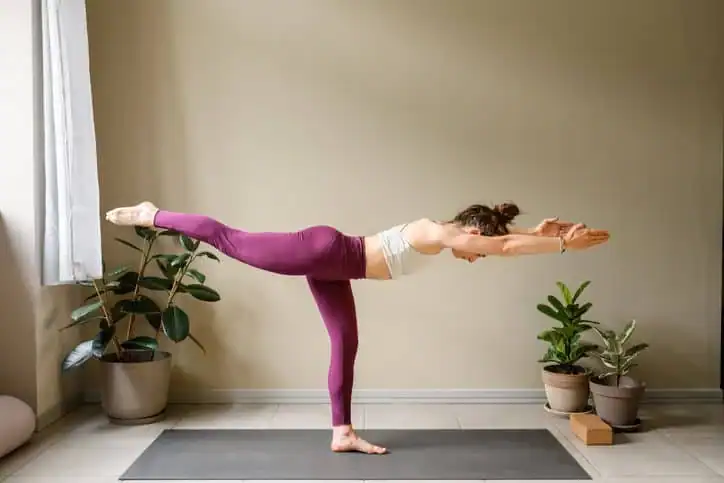 Woman doing Yoga exercise Harrogate to help with toning the body. 